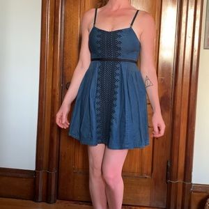 Embroidered denim dress by free people.